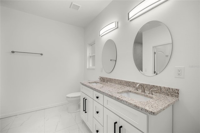 full bathroom with marble finish floor, baseboards, a sink, and toilet