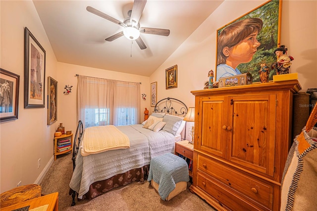 carpeted bedroom with lofted ceiling and ceiling fan