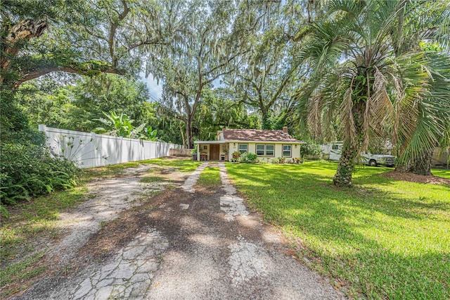 exterior space with a front lawn