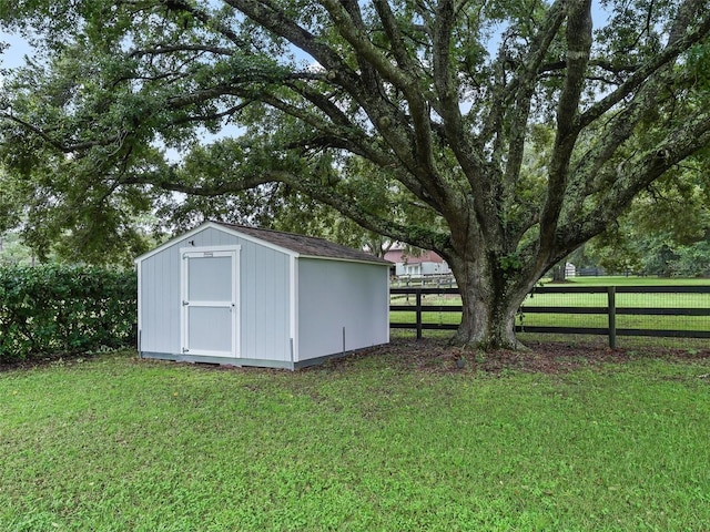 view of outdoor structure with a yard