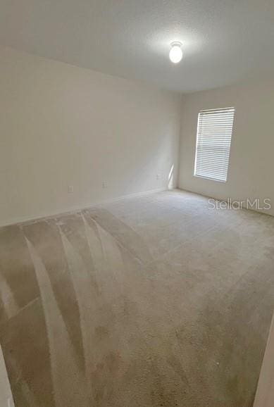 2712 NE 26th St, Ocala, FL 34470 - empty room with carpet floors