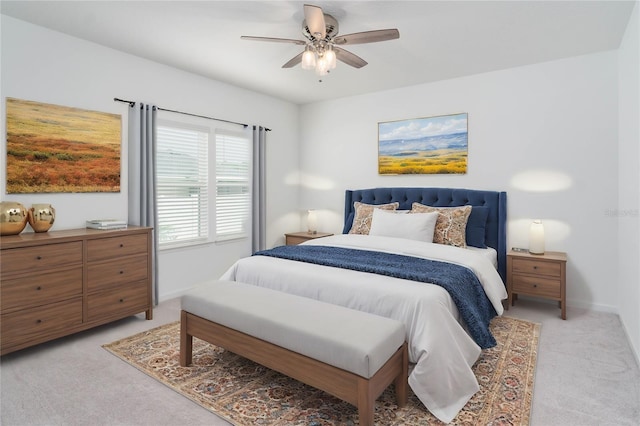 bedroom featuring light carpet and ceiling fan