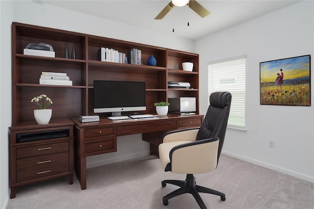 office area featuring light colored carpet and ceiling fan