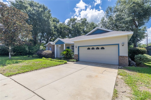 single story home with a garage and a front yard