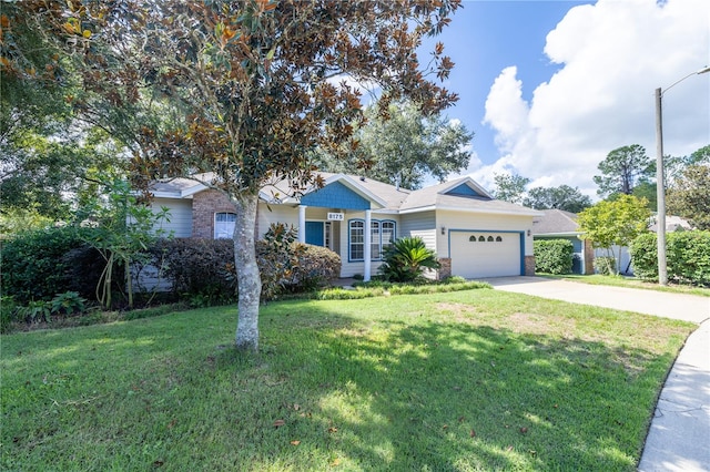 single story home featuring a garage and a front lawn