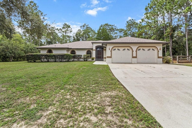 ranch-style home with a front lawn and a garage