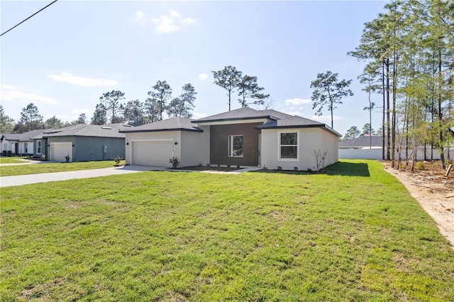 view of front facade with a garage, a front lawn, concrete driveway, and stucco siding