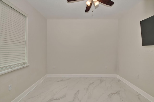 empty room featuring ceiling fan