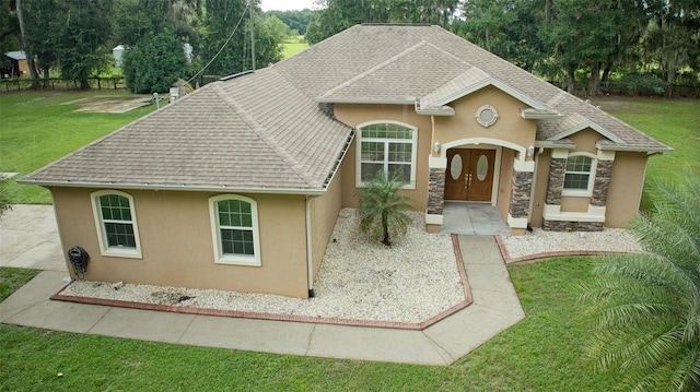 view of front of property with a front lawn