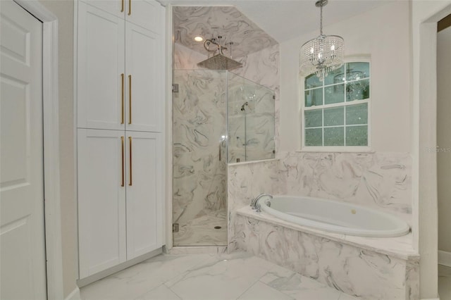 bathroom featuring plus walk in shower and a notable chandelier