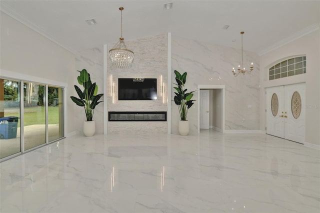 unfurnished living room with a notable chandelier and ornamental molding