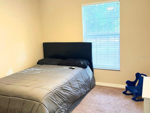 bedroom featuring carpet flooring