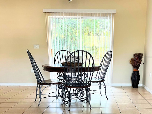 view of tiled dining space