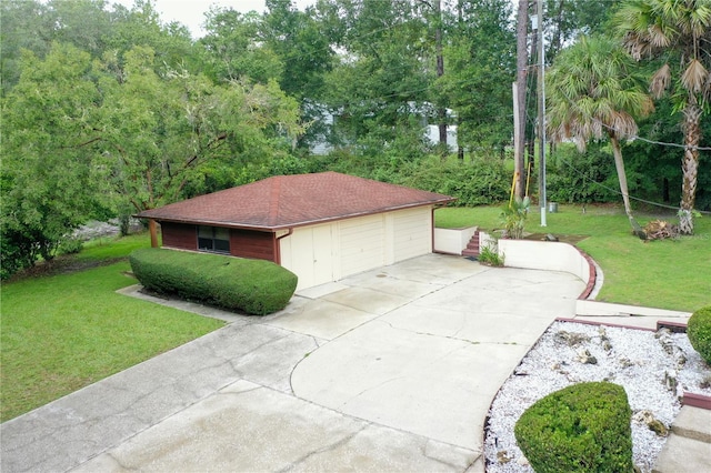 view of property exterior featuring a garage and a yard