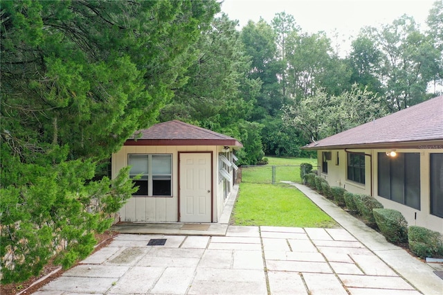 21389 SW 102nd Street Rd, Dunnellon, FL 34431 - view of patio with an outbuilding and fence