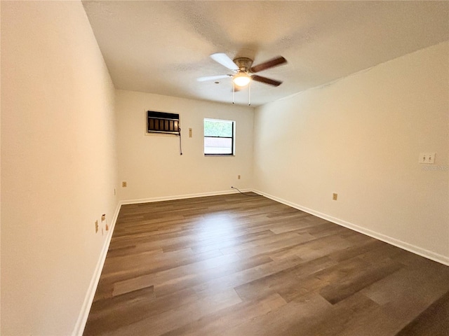 spare room featuring a textured ceiling, ceiling fan, and wood-type flooring