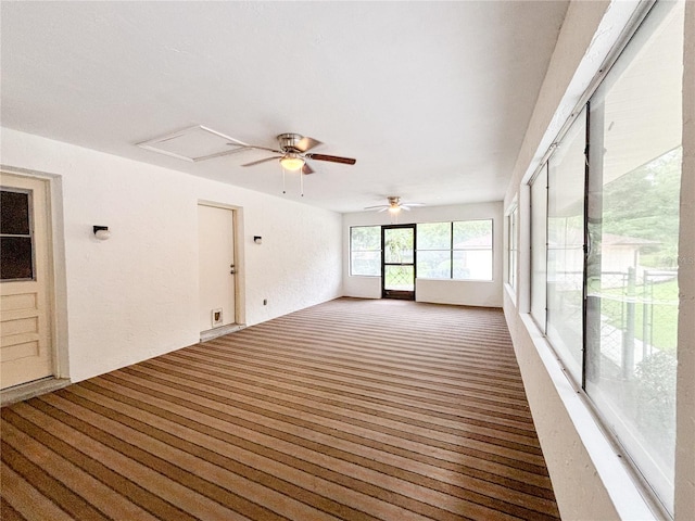 spare room featuring ceiling fan and wood-type flooring