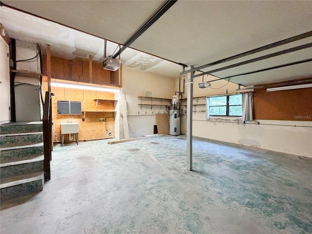 21389 SW 102nd Street Rd, Dunnellon, FL 34431 - garage with a sink, a garage door opener, and hybrid water heater