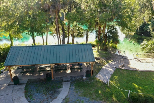 exterior space with a water view