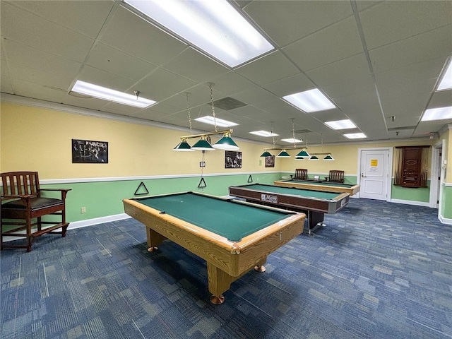 playroom with dark carpet, a paneled ceiling, and pool table