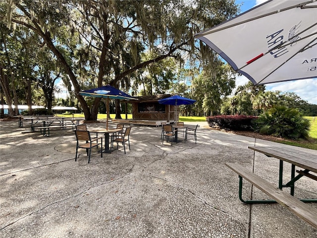 21389 SW 102nd Street Rd, Dunnellon, FL 34431 - view of patio / terrace with outdoor dining space