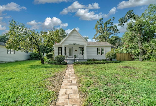 view of front facade featuring a front yard and a porch