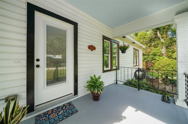 property entrance with a porch