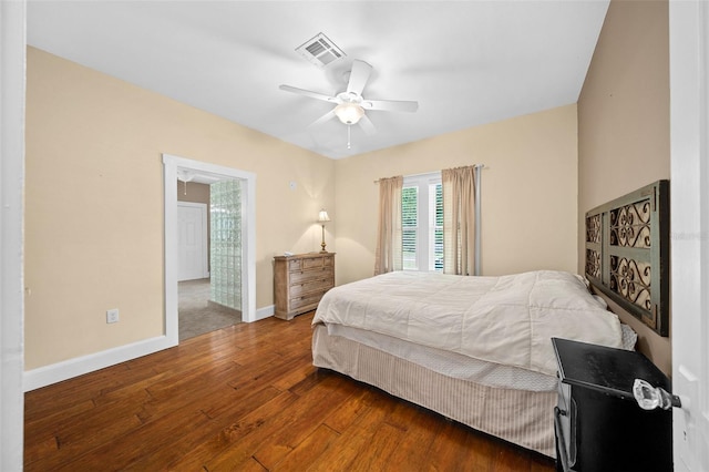 bedroom featuring wood-type flooring and ceiling fan