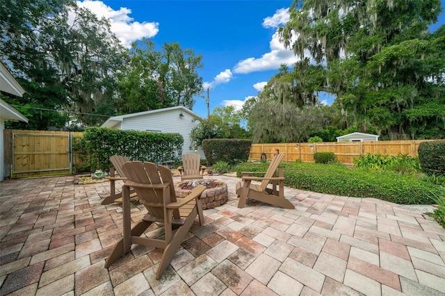 view of patio / terrace with an outdoor fire pit