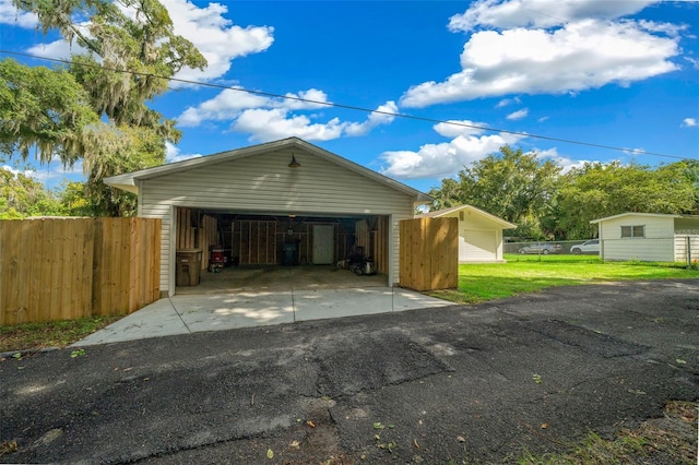 garage featuring a yard