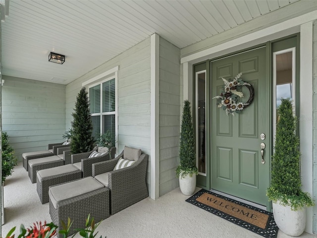 doorway to property with a porch