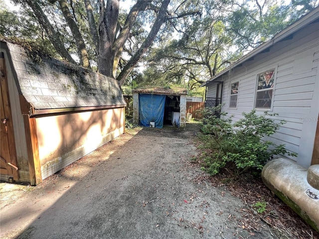 exterior space featuring a storage shed