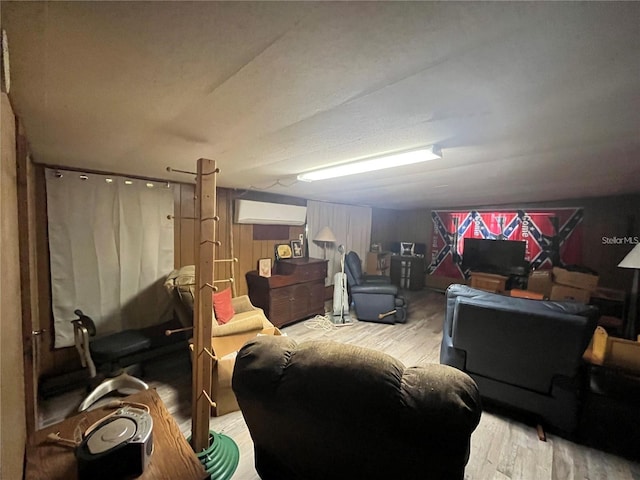 living room featuring lofted ceiling and wood-type flooring