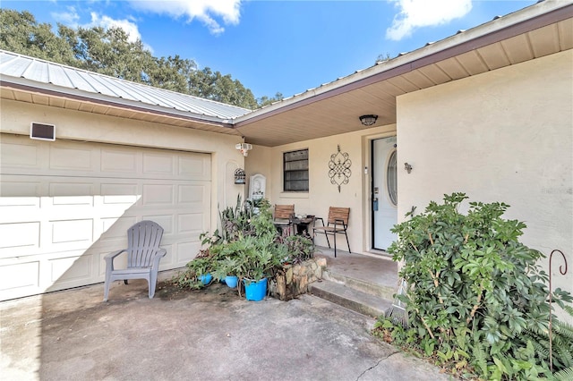 property entrance with a garage