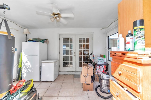 kitchen featuring light tile patterned floors, ceiling fan, french doors, white refrigerator, and refrigerator