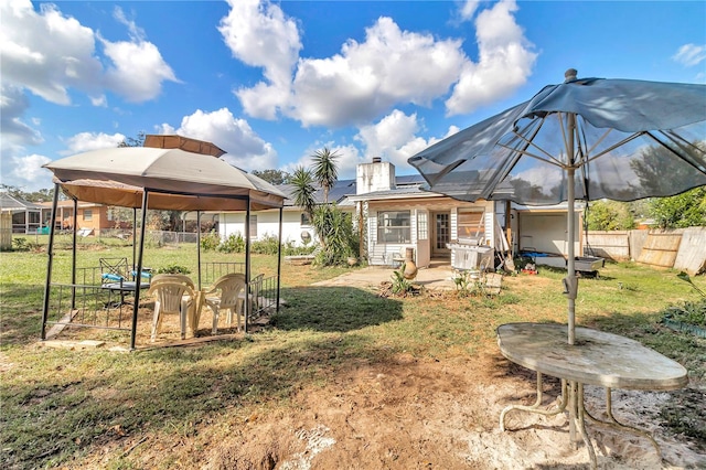 view of yard featuring a gazebo and a patio