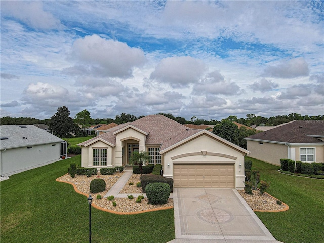 single story home with a garage and a front yard