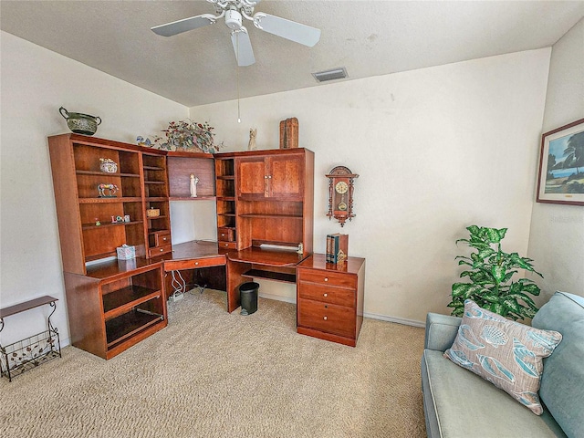 office with ceiling fan and light colored carpet