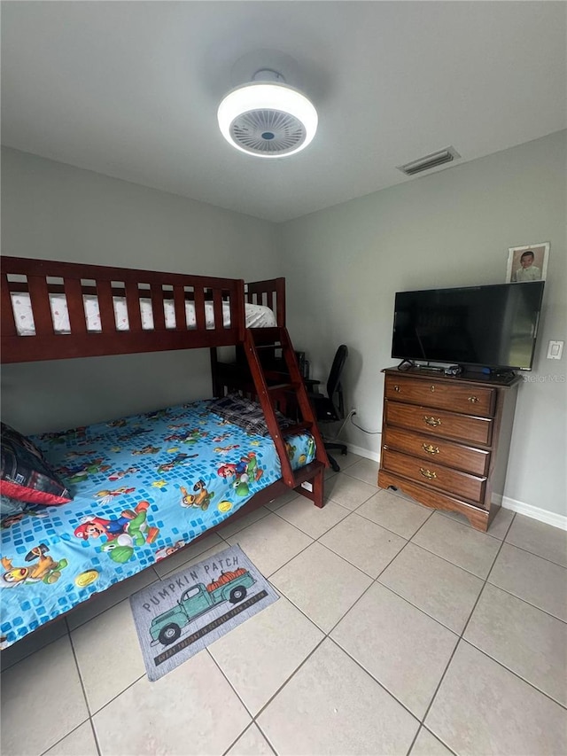 bedroom featuring light tile patterned floors