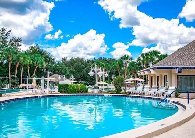 community pool with a patio