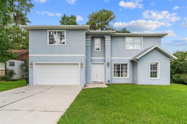 front facade with a garage and a front lawn