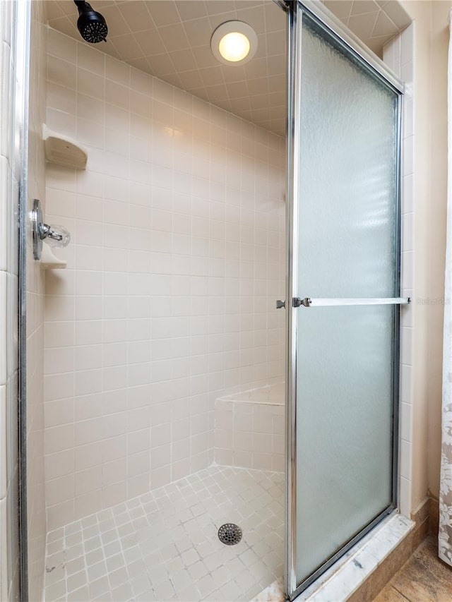 bathroom featuring walk in shower