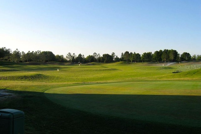 view of community featuring a lawn