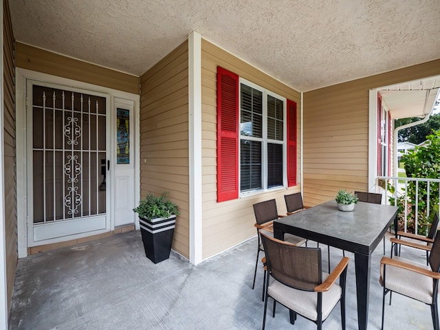 view of patio featuring covered porch