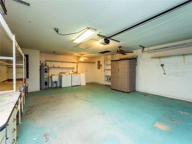 garage with ceiling fan, separate washer and dryer, water heater, electric panel, and a garage door opener