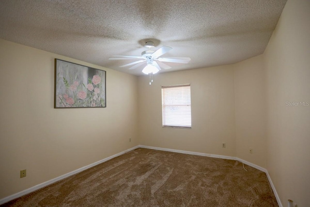 empty room featuring a textured ceiling, carpet flooring, and ceiling fan