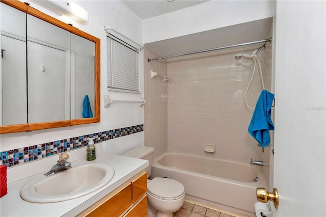 full bathroom with tiled shower / bath combo, vanity, a textured ceiling, decorative backsplash, and toilet