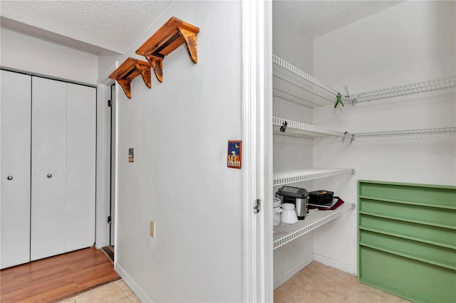 interior space with light tile patterned floors