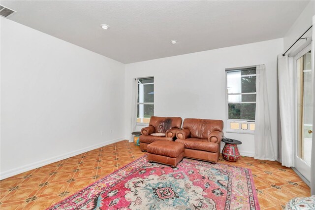 living room featuring a wealth of natural light