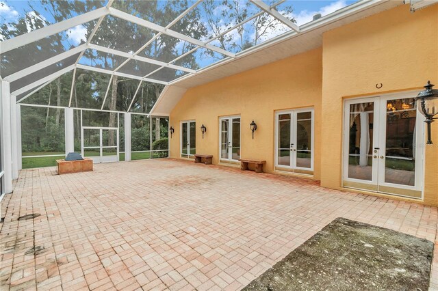 exterior space with vaulted ceiling and french doors